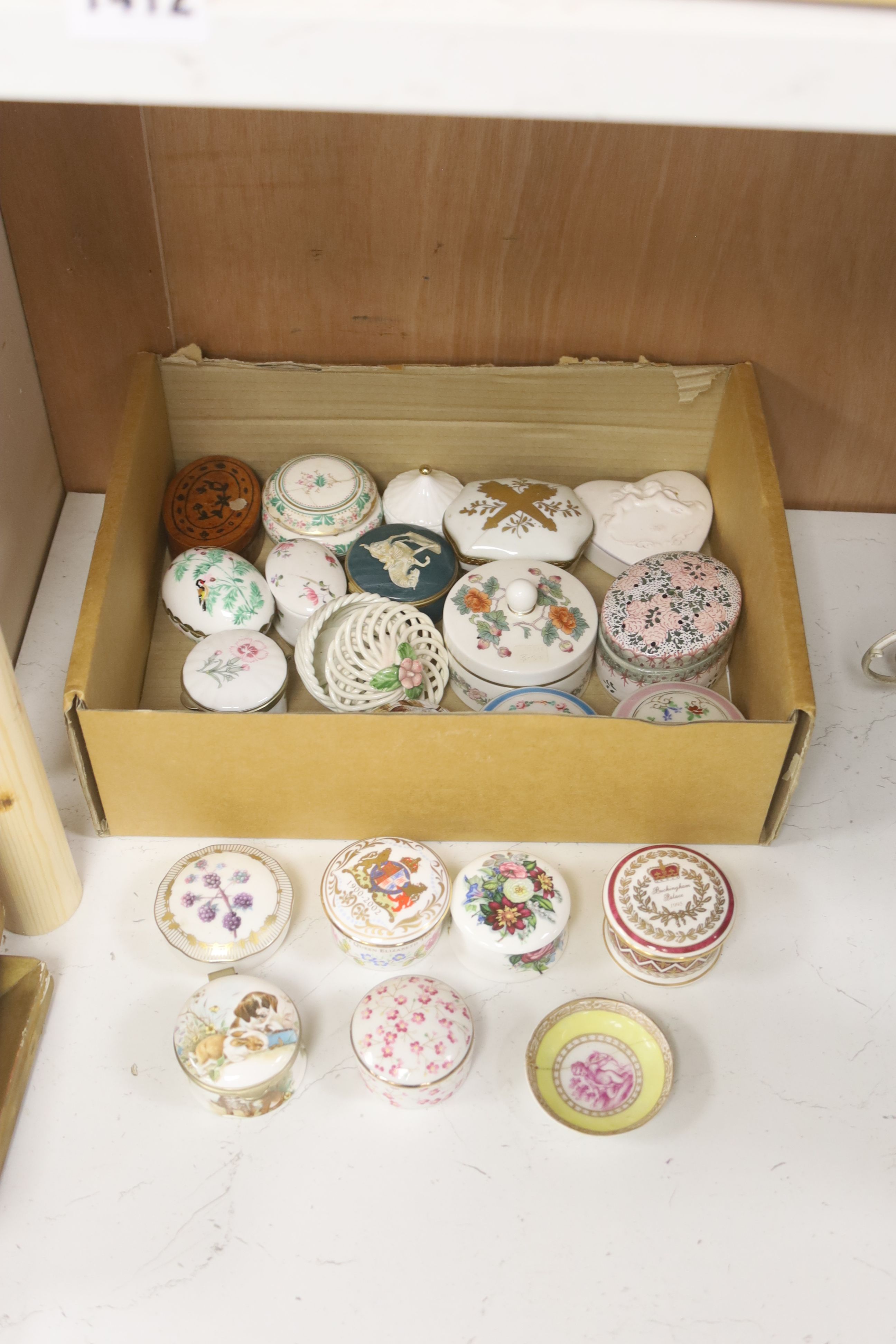 Assorted porcelain boxes and four small prints